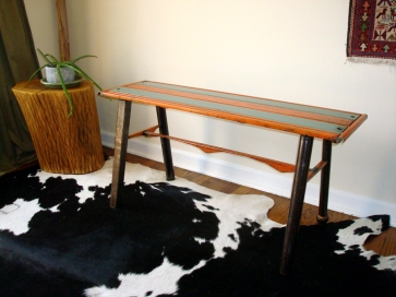 Slat bench- 40" L/ 20" W/ 19" H. Salvaged steel vintage metal awnings, plumbing fittings and pipes for legs.