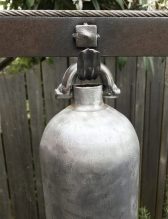 aluminum bell with stainless steel accent : Created from fire extinguisher, laser cut drop, chain, square washer, vintage twist drill wood handle, stainless steel cable, plow disc and plumbing from my bathroom remodel. - 24" W x 64" H