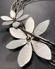 detail of Willow Wreath with Aluminum Flowers, steel and aluminum, 28"W
